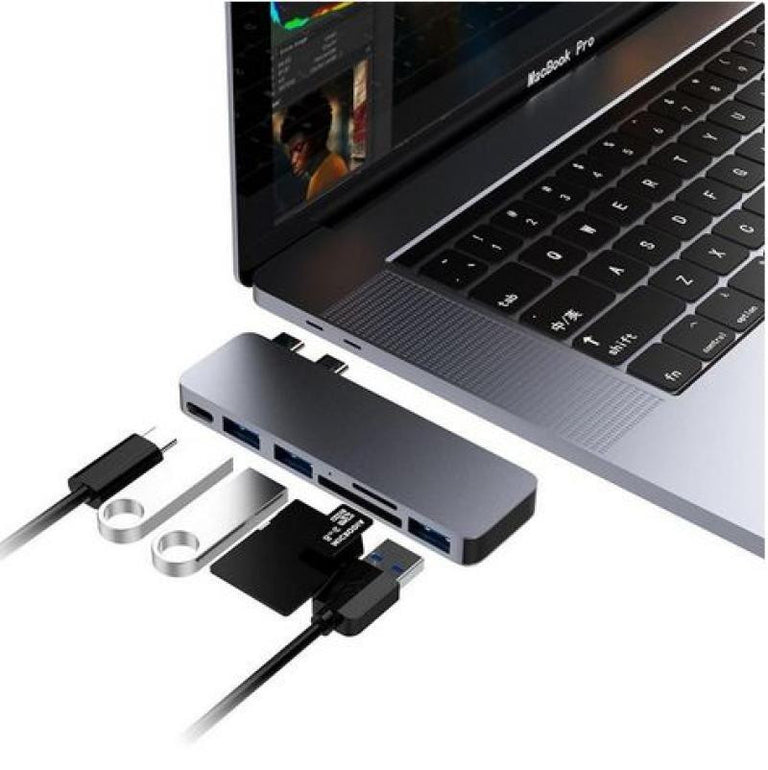 Hub USB com 2 portas USB-A, 3 portas USB, porta Thunderbolt e leitor de cartões SD/Micro SD. 