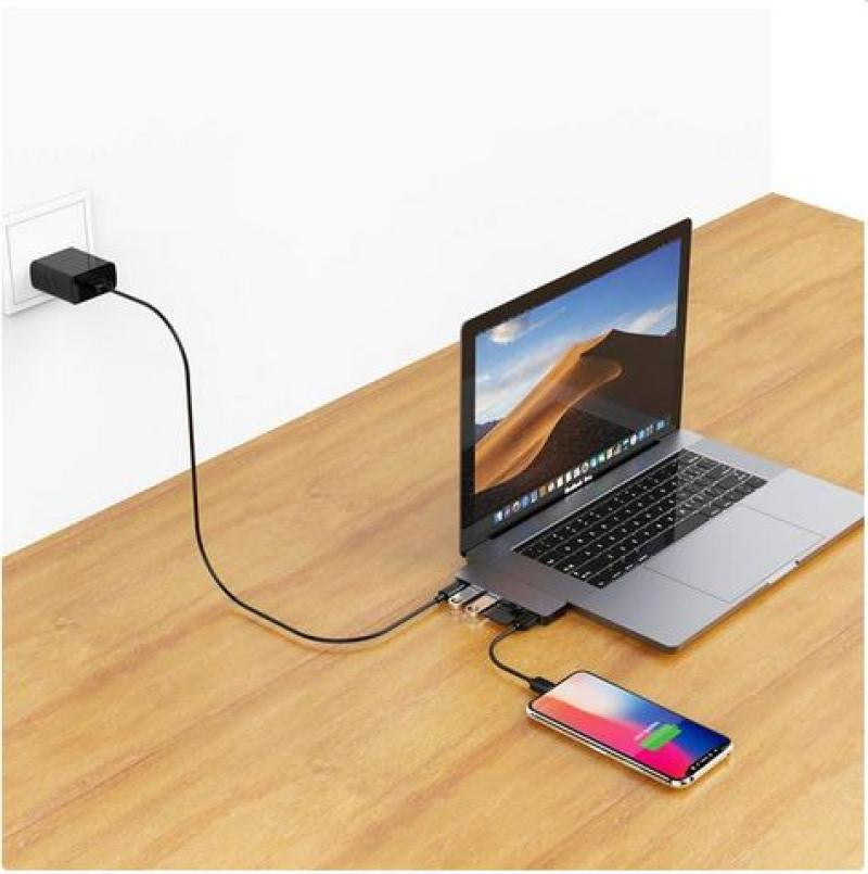 Hub USB com 2 portas USB-A, 3 portas USB, porta Thunderbolt e leitor de cartões SD/Micro SD. 